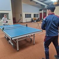 Students playing table tennis