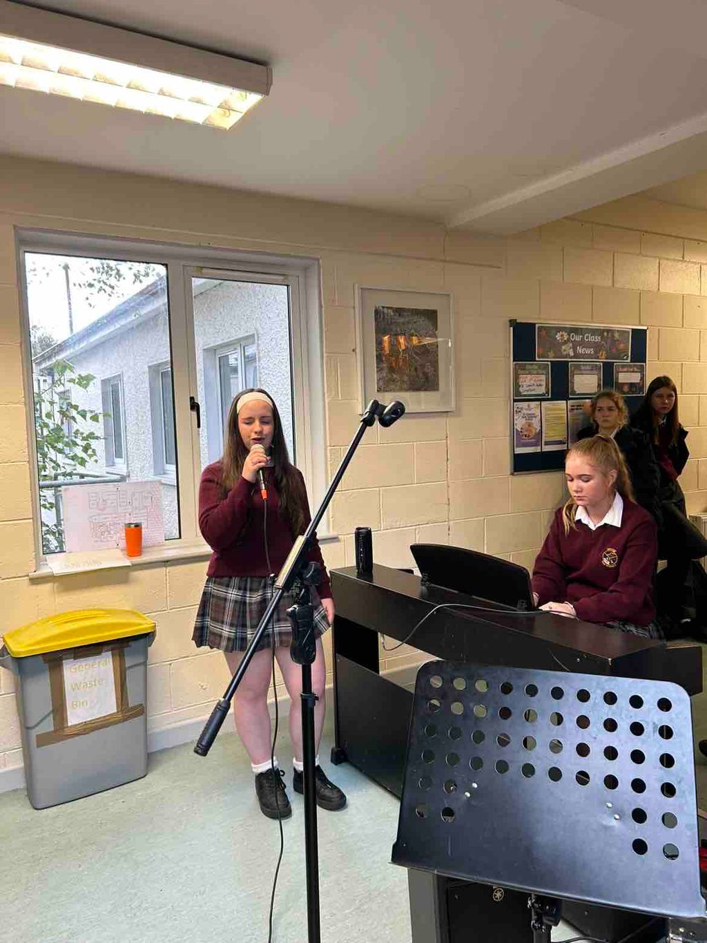 Students performing at Open Mic